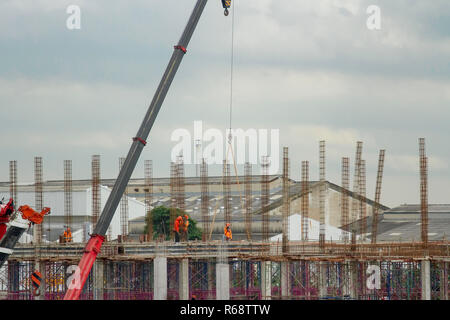 Workers are building a factory. Stock Photo