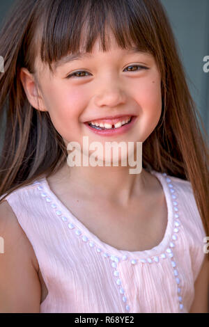 A six year old laughing girl Stock Photo