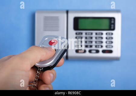 Hand Using Remote Control Stock Photo