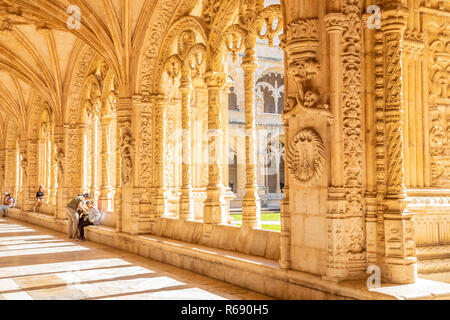 Tourists inside S. Jeronimos monastery in Lisbon, Portugal