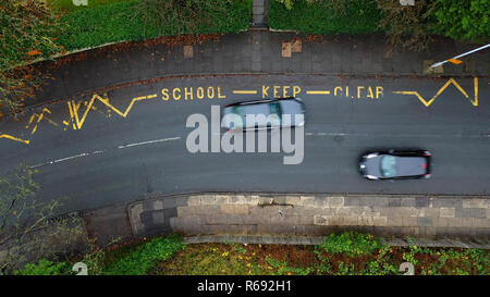 Aerial view of a school keep clear road sign in the UK Stock Photo