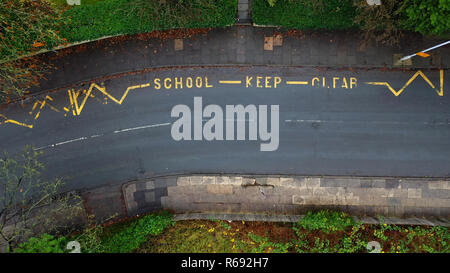 Aerial view of a school keep clear road sign in the UK Stock Photo