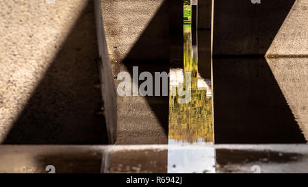 Empty abstract white concrete design with chaotic columns structures. Modern architecture background with abstract lines Stock Photo