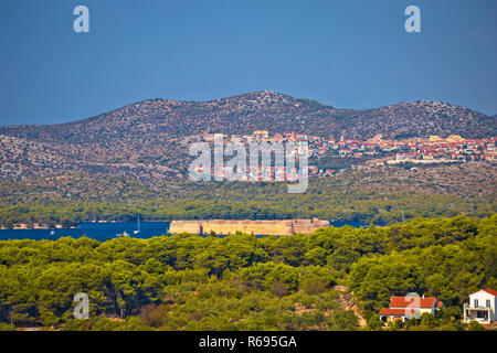 Zlarin island and Saint Nikola fortres in Sibenik bay entrance Stock Photo