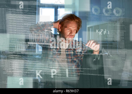 The process of coding. a young computer programmer working on source ...
