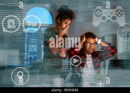Young indian game developers lost their money and very upset Stock Photo