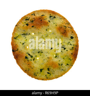 Top view of a single garlic and cheese flavored potato cracker isolated on a white background. Stock Photo