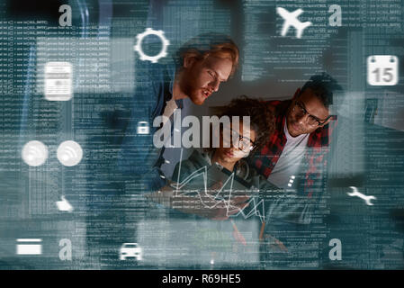 Young multinational code developers, team work of new navigation project Stock Photo