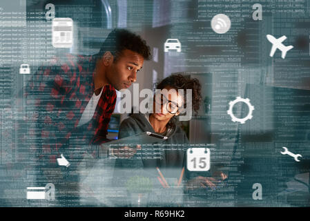 Young multinational code developers, team work of new navigation project Stock Photo