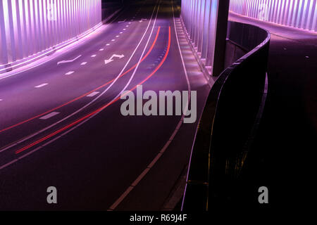 Abstract lines and LED colored architecture . Night scene with an urban city look in a tunnel Stock Photo