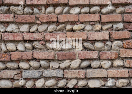 Horizontal Pattern Alternating With Bricks And Boulders Stock Photo