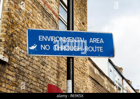 A blue street sign marking environmental controls in a residential area of Islington, London, UK Stock Photo