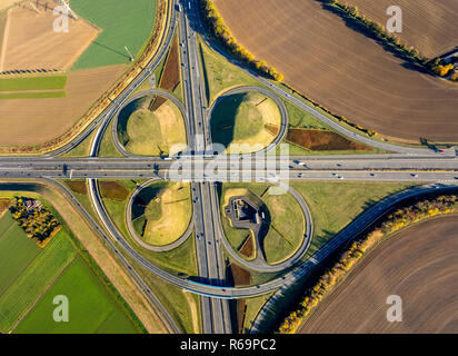 Aerial view, Kamener Kreuz, motorway junction between fields, motorway A2 and motorway A1, Kleeblatt-Form, Kamen, Ruhr area Aerial view, Kamener Kreuz, motorway junction between fields, motorway A2 and motorway A1, Kleeblatt-Form, Kamen, Ruhr area
