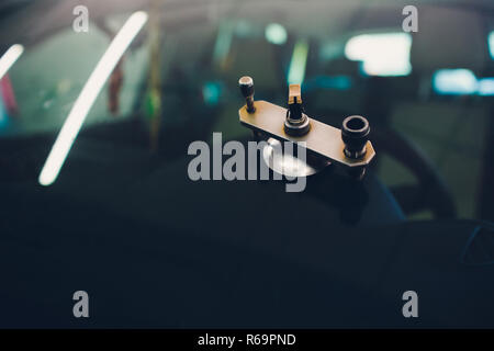 Using tools repairing to fix crack windshield Stock Photo