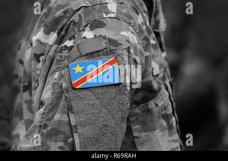 Democratic Republic of the Congo flag on soldiers arm. Army, troops, military, Africa (collage). Stock Photo