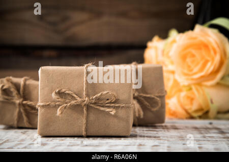 gift or present box and flowers. a gift for Valentine's day or a woman's day Stock Photo