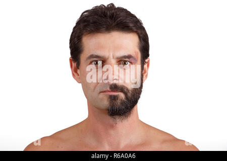 portrait of man with half shaved face Stock Photo