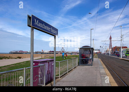 Manchester Square street sign with Central pier and Blackpool tower in Blackpool Lancashire UK Stock Photo