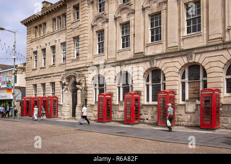 8 K2 telephone boxes outside the former police head quarters and General Post Office and Sorting office building in Abingdon Street Blackpool UK Stock Photo