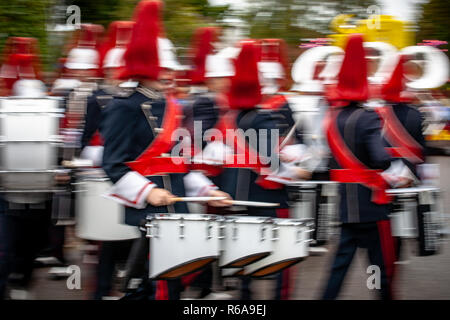 Various details of a performing wind band during a performance or concert with brass and percussion instruments Stock Photo