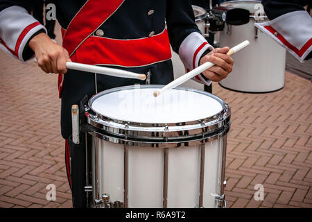 Various details of a performing wind band during a performance or concert with brass and percussion instruments Stock Photo