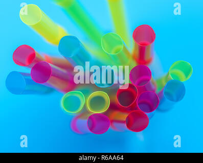 multi-colored plastic tubes for a cocktail Stock Photo