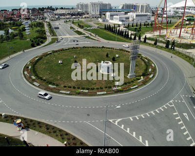 Sochi, Russia - June 2 2018. Circular road junction at the Olimpiyskiy prospekt in Adler Stock Photo