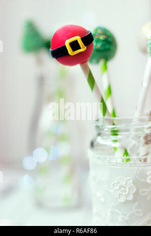 Christmas decorated cake pops; holiday background Stock Photo