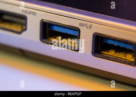 Closeup of fast blue USB 3 ports in a laptop Stock Photo