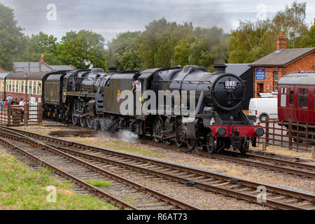 48624 and 73156 double-head recreating the 15 Guinea Special at an event to mark 50 years since the end of steam on British Railways Stock Photo