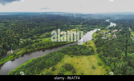 Aerial drone footage of river Neris during cloudy summer day Stock Photo