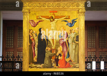 The Crucifixion with St John Baptist, St Anthony, St John, St Bernard, San Bernardino, St Francis and Mary Magdalene (by Neri di Bicci 1464) - Fiesole Stock Photo
