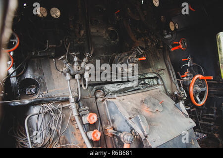 Details and different images of locomotives, marshalling yard, wagons, carriages and train stations in an old industrial heritage museum in the nether Stock Photo