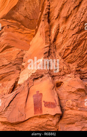 Crowned Figure Pictograph, Barrier Canyon style anthropomorph, near Hog Springs Picnic Area, Bicentennial Highway, Colorado Plateau, Utah, USA Stock Photo