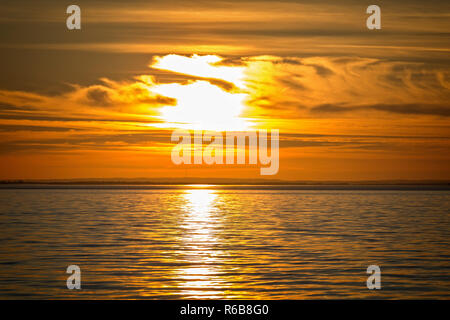 Colorful sunset over the lake Balaton in Hungary. Stock Photo