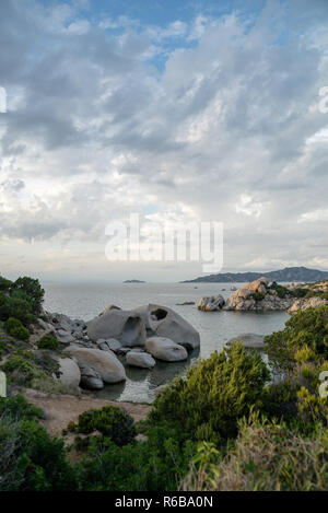 beach with rocks at the italian island sardinia in mediterranean sea Stock Photo