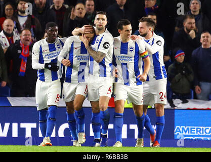 Brighton & Hove Albion's Glenn Murray (second left) celebrates scoring his side's first goal of the game from the penalty spot with team-mates during the Premier League match at the AMEX Stadium, Brighton. Stock Photo