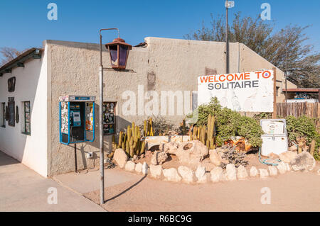 old telephone booth and old lamp in Solitaire gas station, Namibia Stock Photo