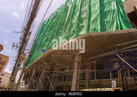 PATTAYA,THAILAND - OCTOBER 18,2018: Soi Buakhaow This is a construction site in the street.It was not know what the purpose of this new building will  Stock Photo