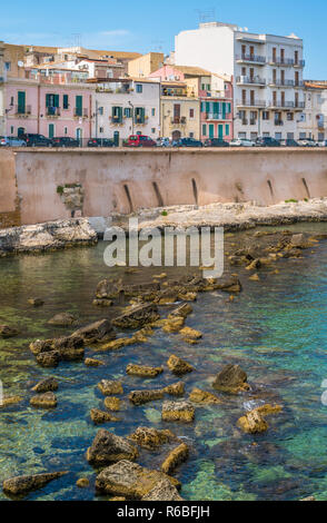 Siracusa waterfront in Ortigia on a sunny summer day. Sicily, southern Italy. Stock Photo
