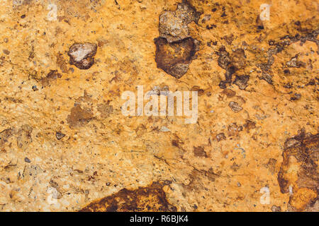 Rock layers - a colorful formations of rocks stacked over the hundreds years. Interesting background with fascinating texture. Stock Photo