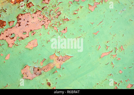 Green metal texture with patches of rust steel on its surface, taken outdoor Stock Photo