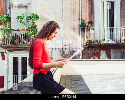 Cute woman holding a map. Travel and tourism concept Stock Photo