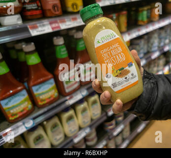 https://l450v.alamy.com/450v/r6bxhp/a-shopper-chooses-a-bottle-of-primal-kitchen-brand-organic-spicy-brown-mustard-in-a-supermarket-in-new-york-on-thursday-november-29-2018-kraft-heinz-announced-it-will-buy-the-paleo-diet-condiment-and-dressing-company-primal-kitchen-for-200-million-richard-b-levine-r6bxhp.jpg