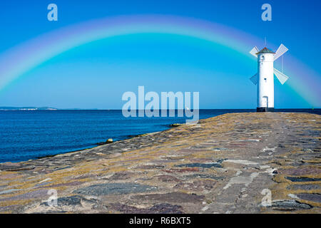 Swinoujscie, Town'S Landmark With Rainbow Stock Photo