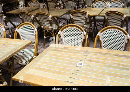 empty tables in outdoor cafe in Troyes city Stock Photo