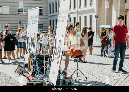 Germany, Berlin, September 05, 2018: A group called Blowing Doozy plays jazz on the square next to the Brandenburg Gate. A musical performance for tourists and locals. Stock Photo