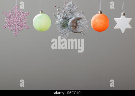 Different multi-colored toys for the Christmas tree, isolated on white background Stock Photo