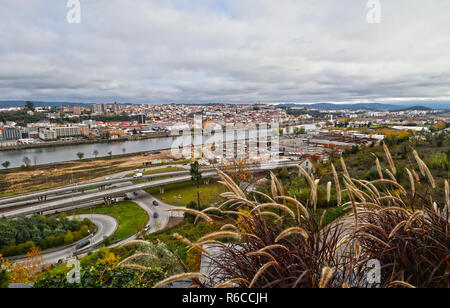 A landscape image of Coimbra, Portugal’s Third City, captured on an overcast winters day. The River Mondego sits in the distance adjacent to the old a