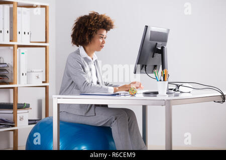 Businesswoman Working On Computer Stock Photo